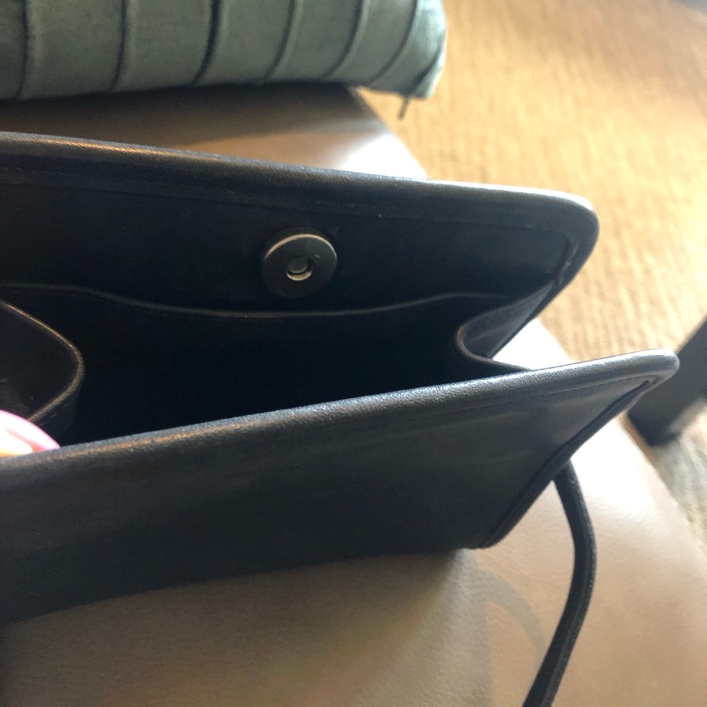 Coach brand cross body. Black, snap top